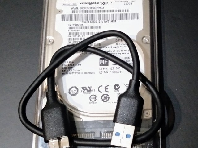 Внешний жесткий диск 320 GB для хранения данных в отличном состоянии - 1/3